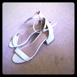 Cute white chunky heels.